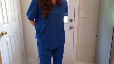 Nurse wetting her scrubs