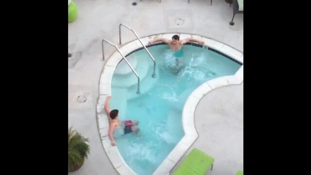 Two bros chilling in a hot tub five feet apart cause they're not gay