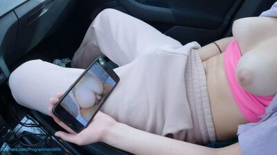 Teen masturbates in a public car park watching her porn video - ProgrammersWife