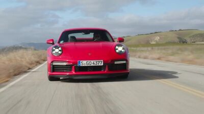 Новый Порше 911 Турбо S Porsche 911 Turbo S 2021 выглядит великолепно в красном цвете